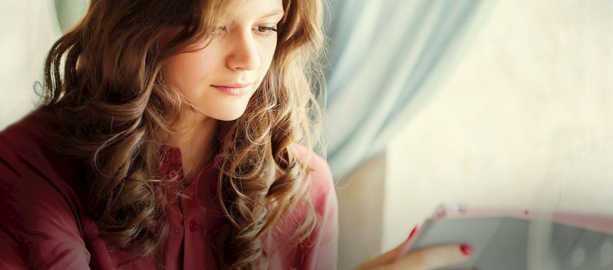 woman looking at laptop