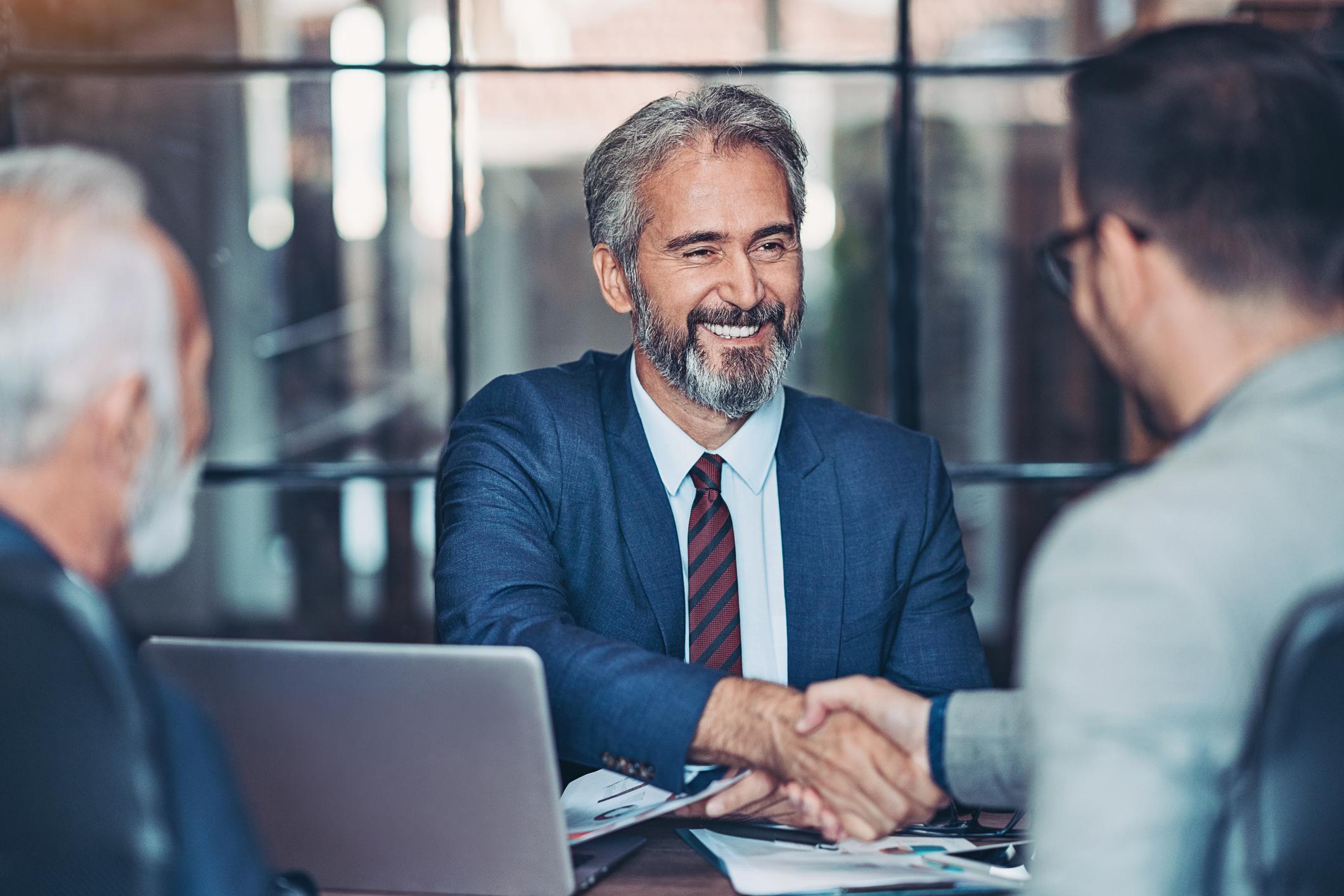 men shaking hands